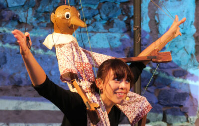 Locandina o scena del tour teatrale Pinocchio